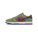 Left Nike Dunk Low sneaker in green suede with brown overlays, purple swoosh and laces, white midsole, and purple outsole, shown from the outside toe-left angle.
