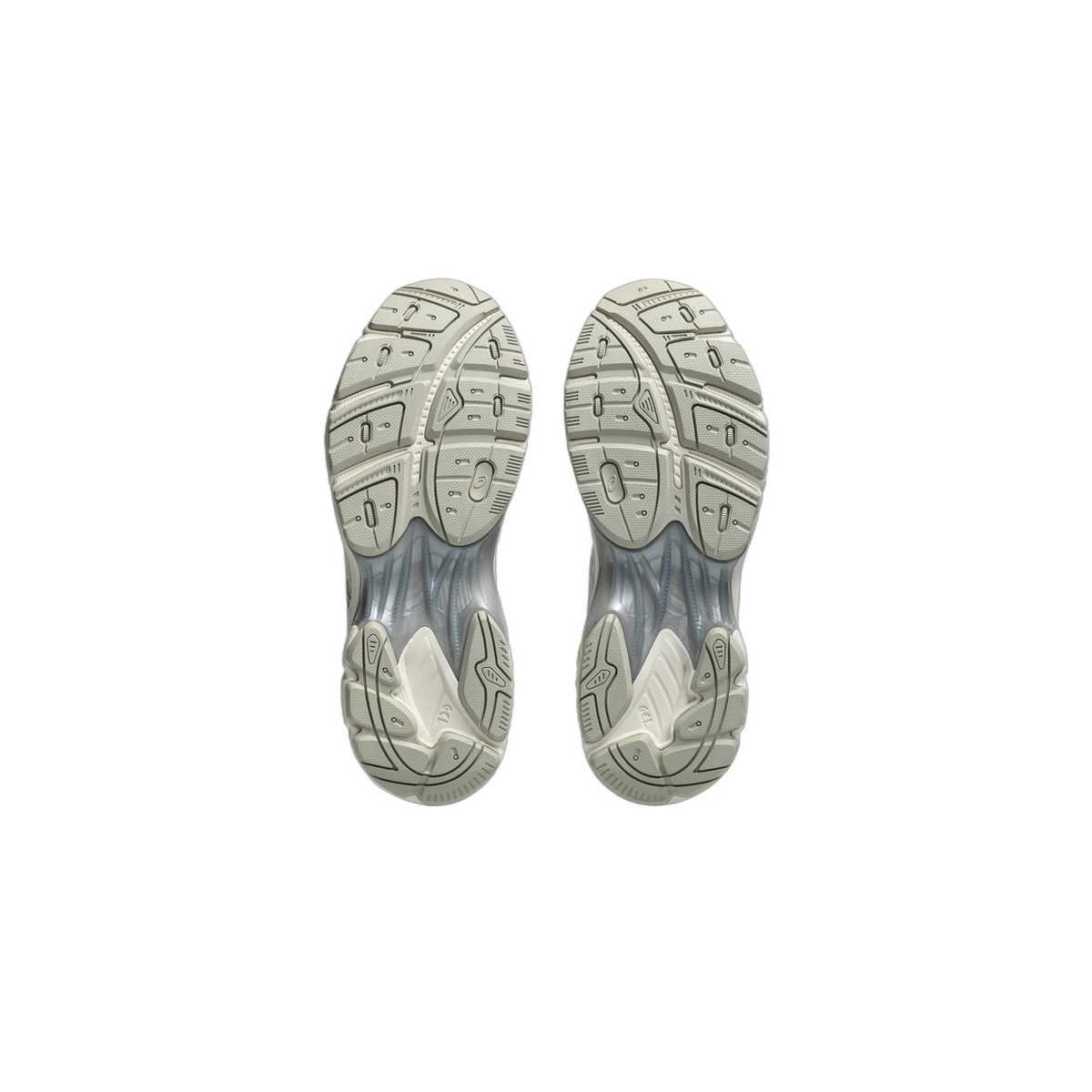 Bottom view of a pair of Asics GT-2160 sneakers showing the tan and gray tread pattern with visible Gel cushioning window at the heel.