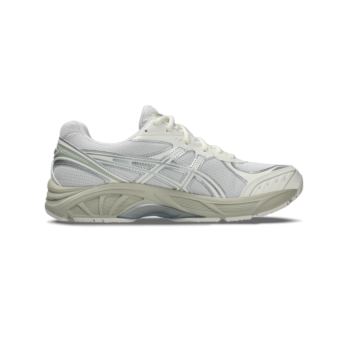 Side view of a white Asics GT-2160 running shoe with silver GEL branding and a beige midsole, toe pointing right.