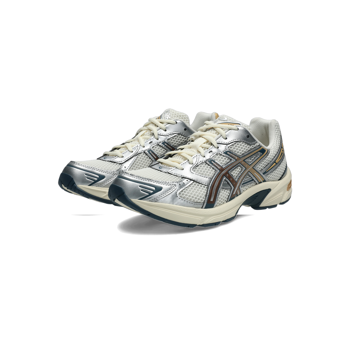 Pair of Asics Gel-1130 sneakers in cream, silver, and brown with mesh toe panels and navy outsoles, angled toward the left.