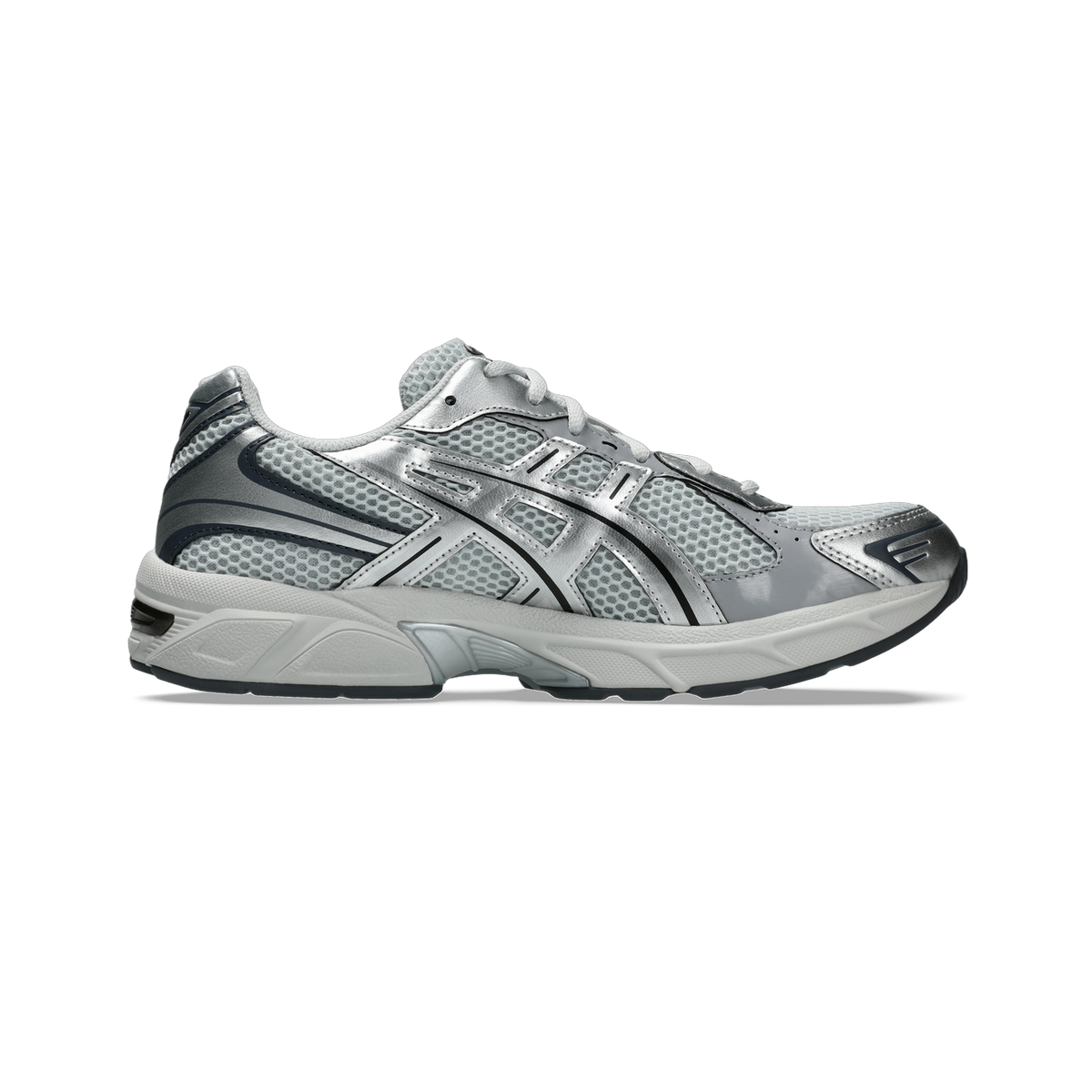 Side view of a gray and silver Asics Gel-1130 sneaker with mesh panels, silver overlays, and a white midsole.