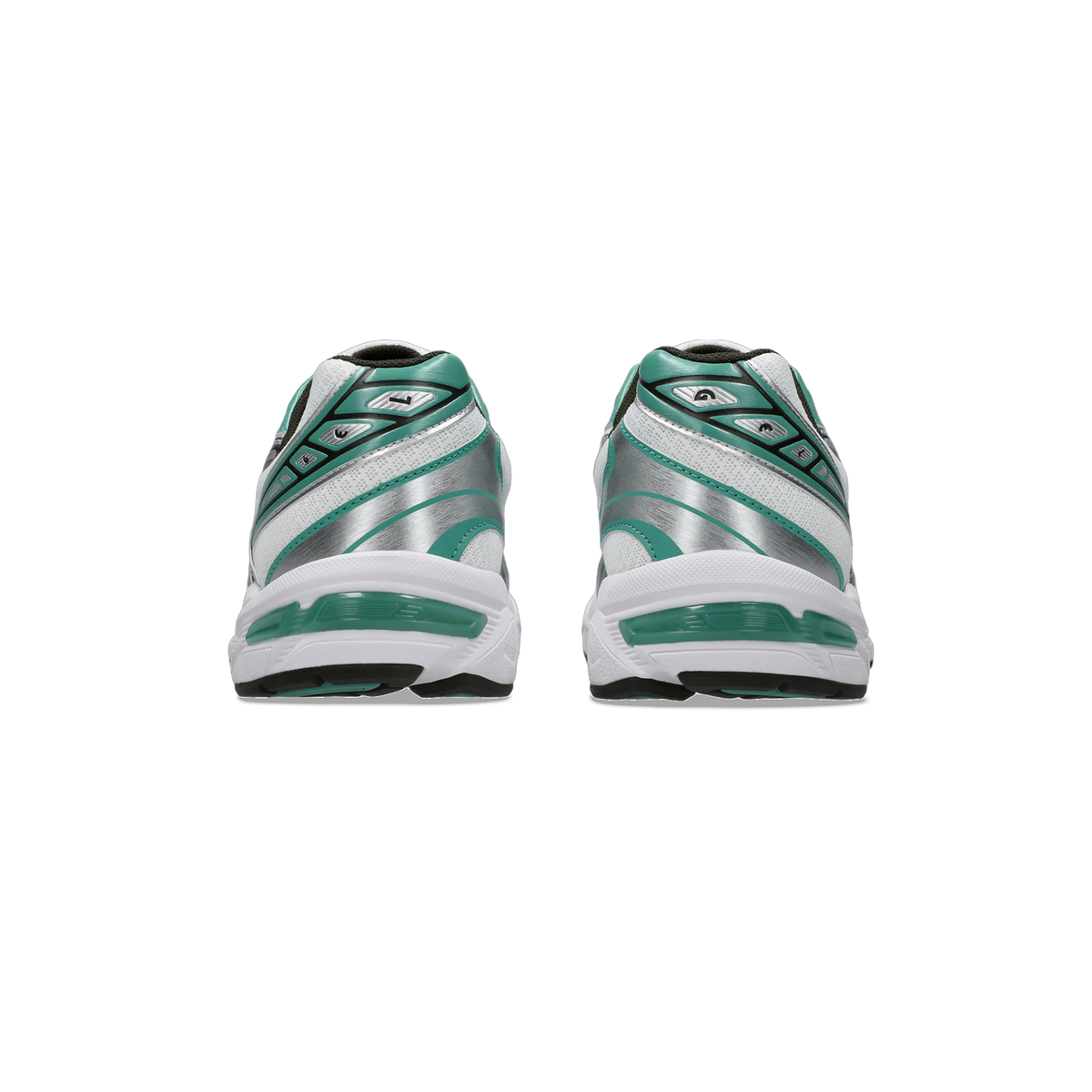 Rear view of a pair of white Asics Gel-1130 sneakers with green and silver heel accents and black outsoles
