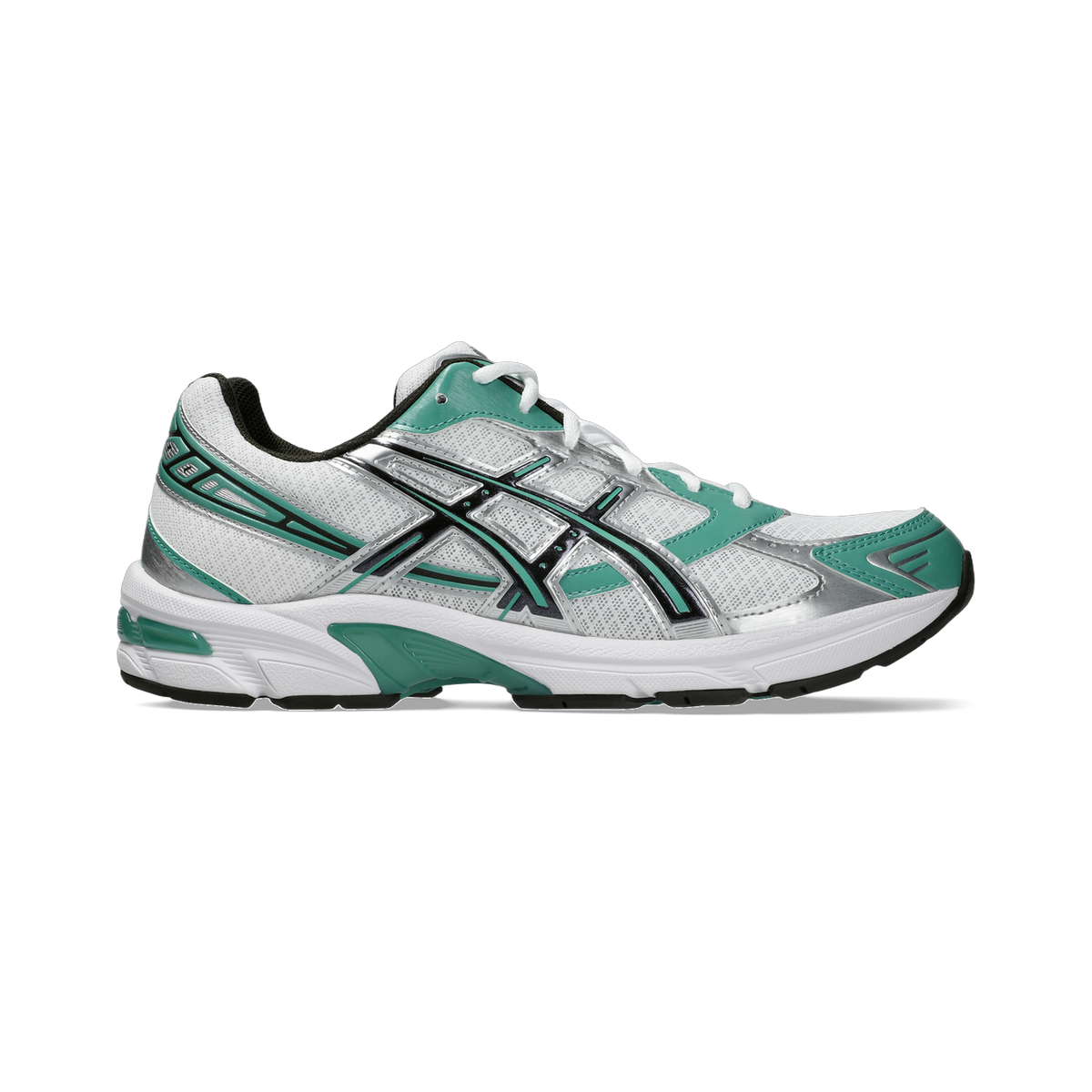 Side view of a white Asics Gel-1130 running shoe with green accents and black stripe overlays, toe pointing left