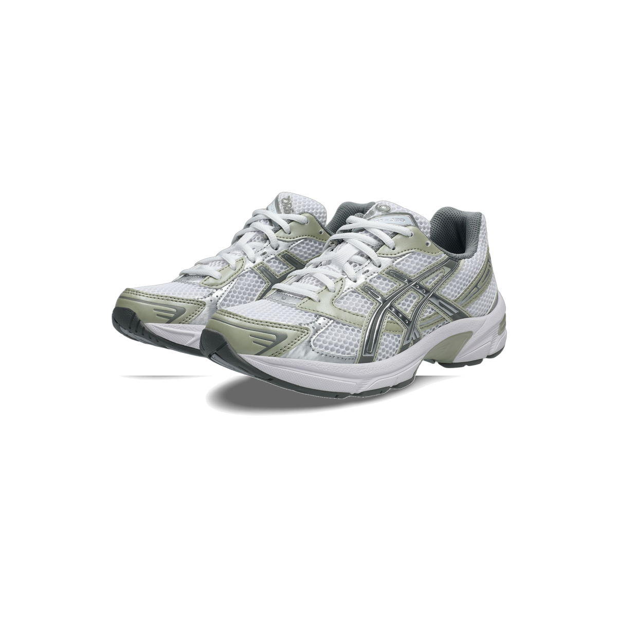 Pair of white Asics Gel-1130 running shoes with sage green overlays and silver lace detailing, angled toward the left with soles visible.