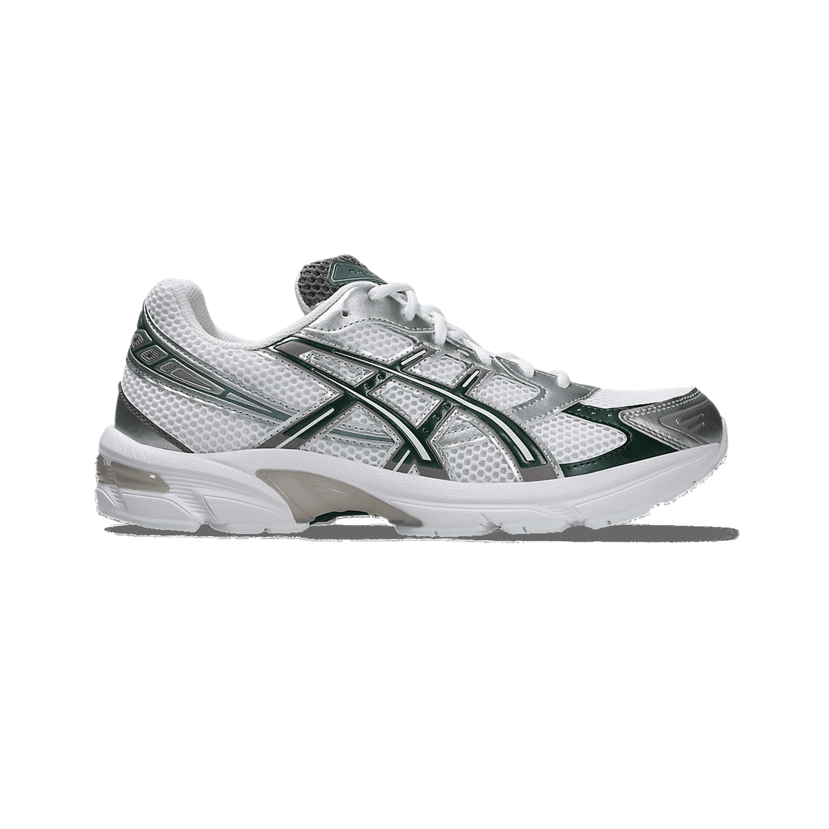 Inside view of a white Asics Gel-1130 sneaker with dark green overlays and silver mesh panels, toe pointing right