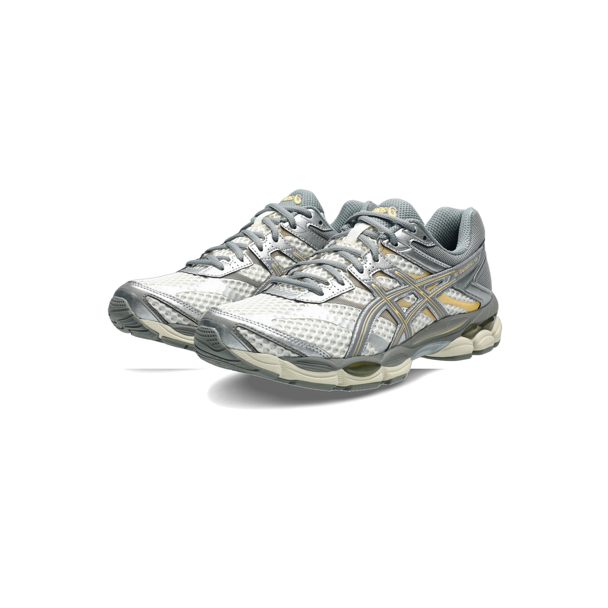Pair of Asics Gel-Cumulus 16 running shoes in white mesh with gray and gold accents, shown from an angled front view.