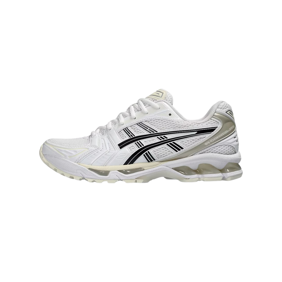 Side profile of a white ASICS Gel-Kayano 14 sneaker with black overlay stripes, a cream-toned midsole and heel accents, and a silver-grey Gel unit visible at the heel, toe pointing left.