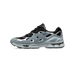 Side view of a black and grey Asics Gel-NYC sneaker with mesh panels, suede overlays, and a chunky layered outsole, toe pointing left.