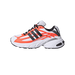 Side view of a white Adidas Adistar XLG 2.0 running shoe with orange overlays, black three-stripe logo, and a chunky white midsole.