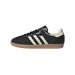 Side view of a black basketweave adidas Samba OG sneaker with cream stripes and heel tab, gum outsole, toe pointing left.