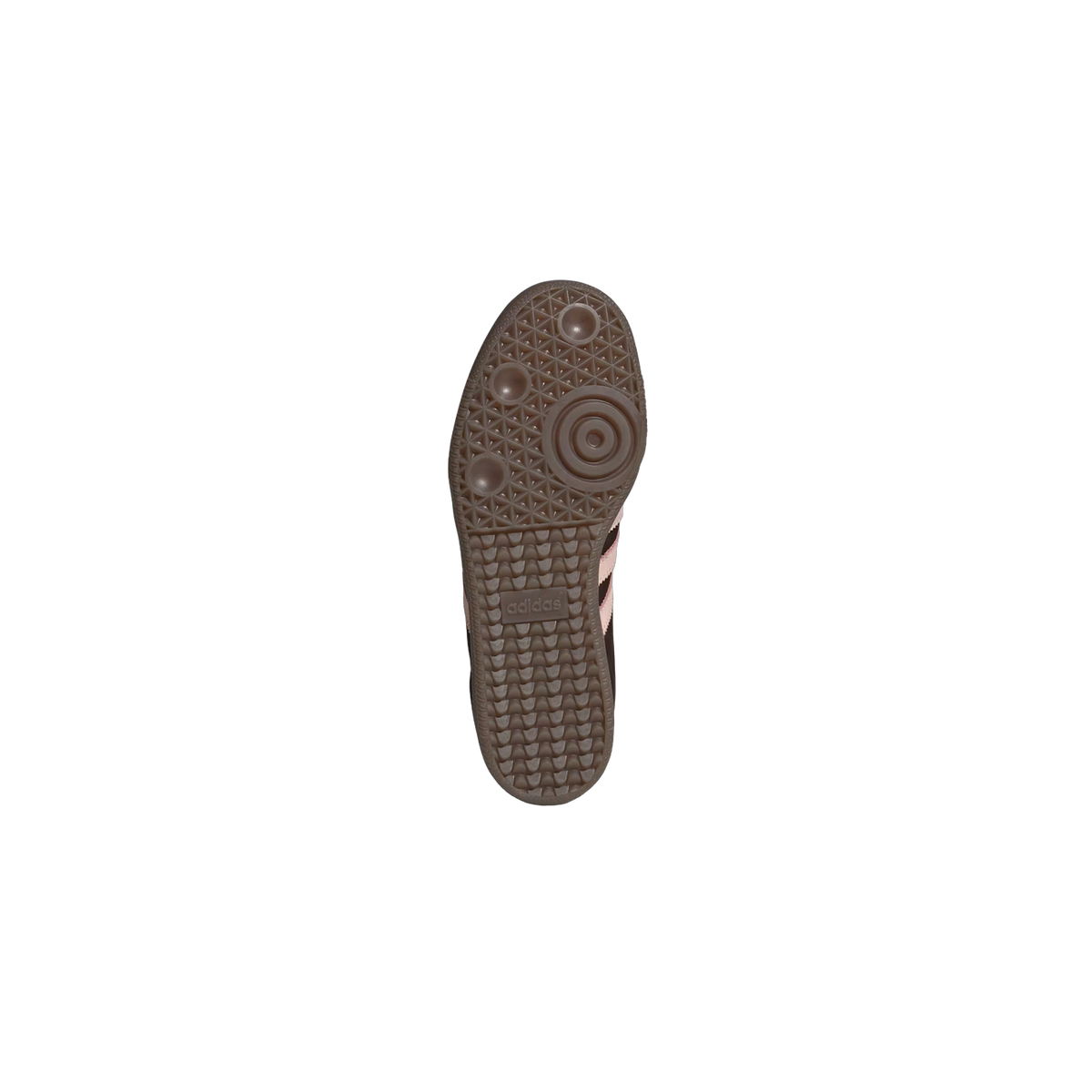 Bottom view of a brown and pink Adidas Samba OG sneaker showing the gum rubber outsole with circular and triangular tread pattern and embossed adidas logo