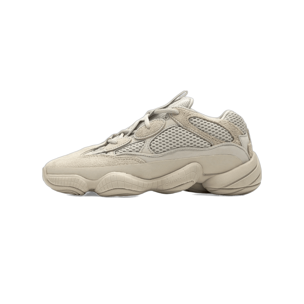 Single beige Adidas Yeezy 500 sneaker shown from the side with toe pointing left, featuring chunky sole and mesh and suede paneling