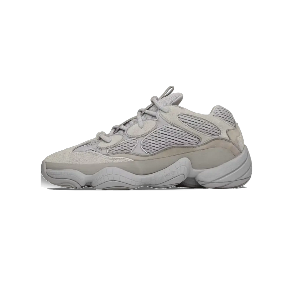 Side view of a grey Adidas Yeezy 500 sneaker with mesh and suede paneling, toe pointing left, chunky textured midsole and laces
