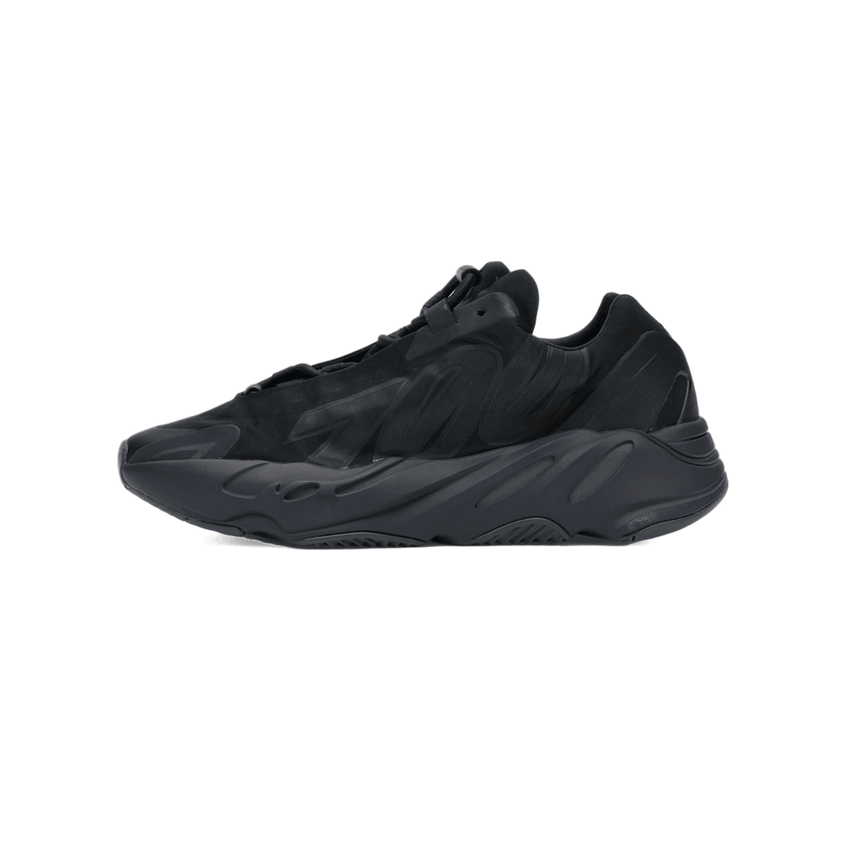 Side view of a black Adidas Yeezy Boost 700 MNVN sneaker with toe pointing left, featuring a chunky layered midsole and lace-up closure.