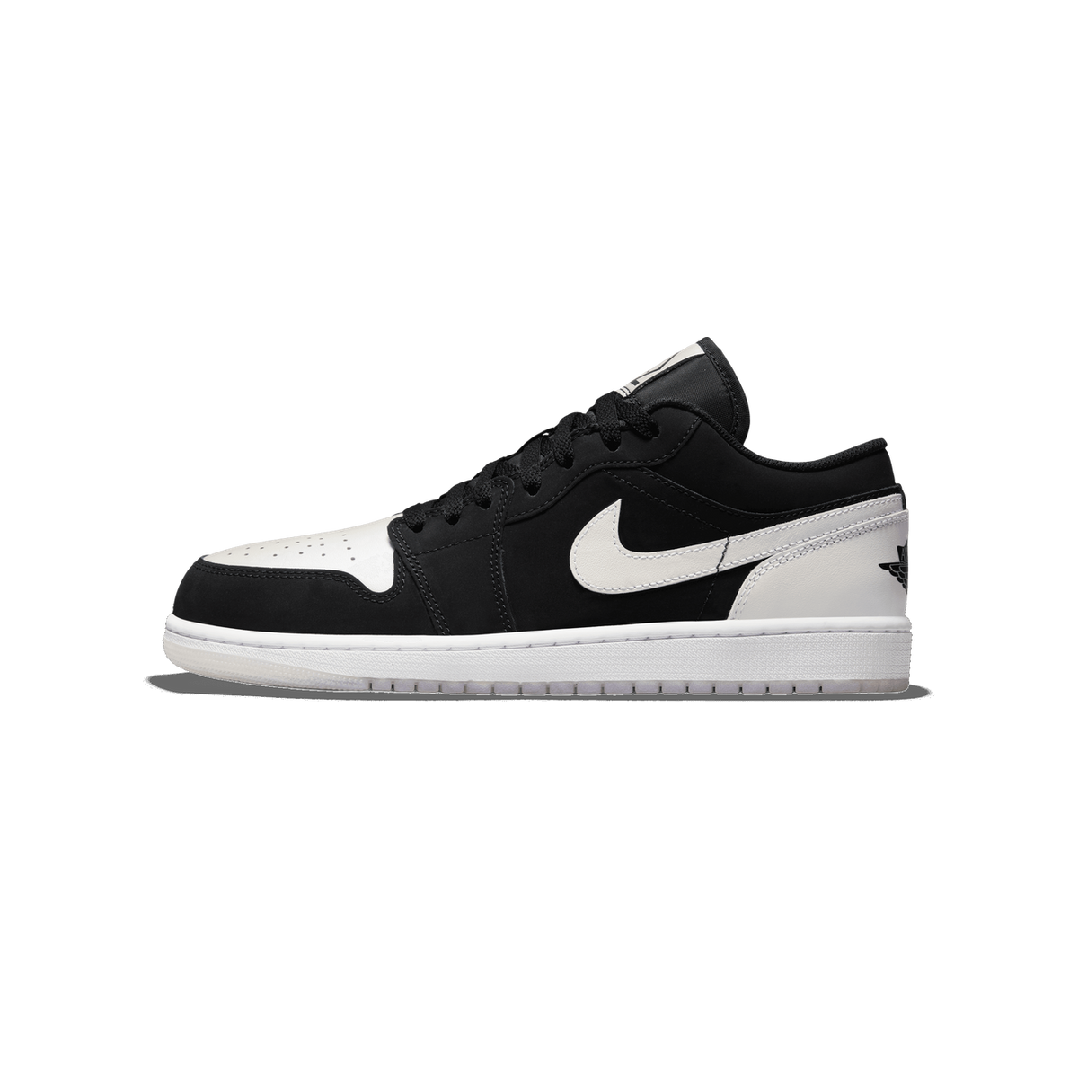 Left Jordan 1 Low sneaker in black and white with toe pointing left, showing a white Nike swoosh on the black side panel and white midsole