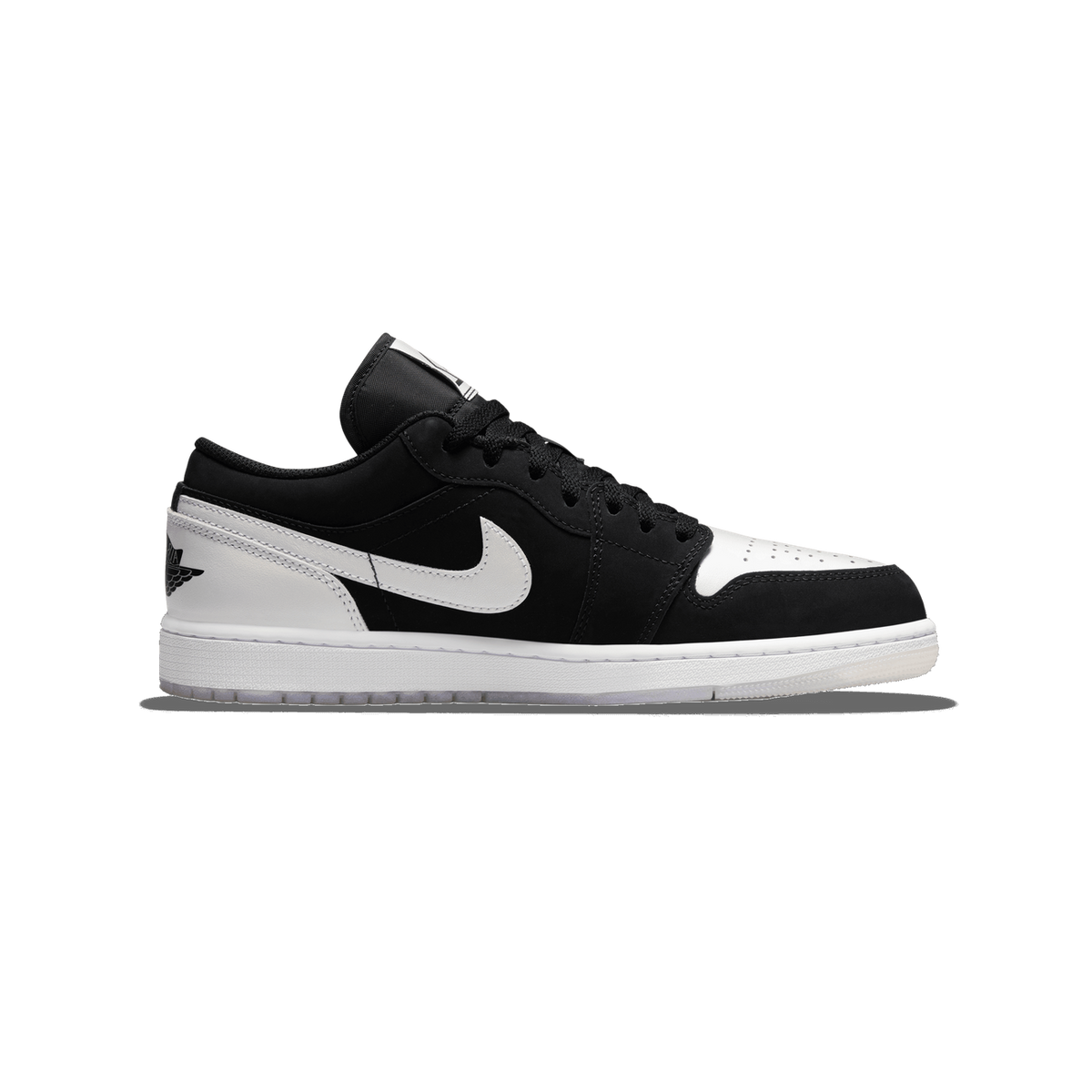 Left Air Jordan 1 Low sneaker in black and white with toe pointing left, showing the white Nike swoosh and wings logo on the heel