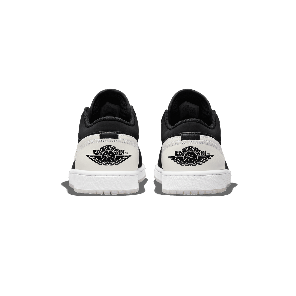 Rear view of a pair of black and white Air Jordan 1 Low sneakers showing the Wings logo heel tabs and white outsoles