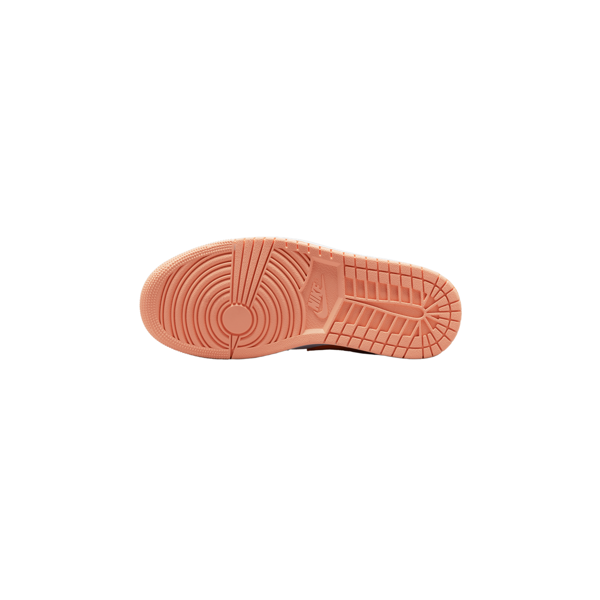 Underside view of a single sneaker showing a peach-orange rubber outsole with circular and grid tread patterns and a embossed Nike Swoosh logo near the arch.