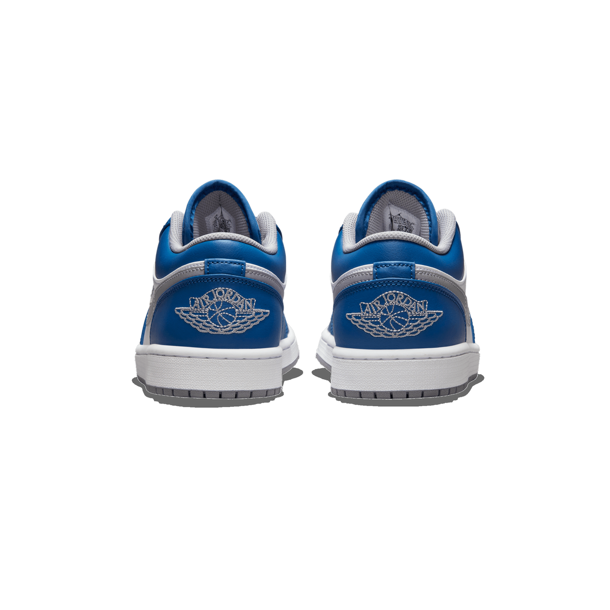 Rear view of a pair of blue and white Jordan 1 Low sneakers showing the embroidered Wings logo on the heel and white rubber soles