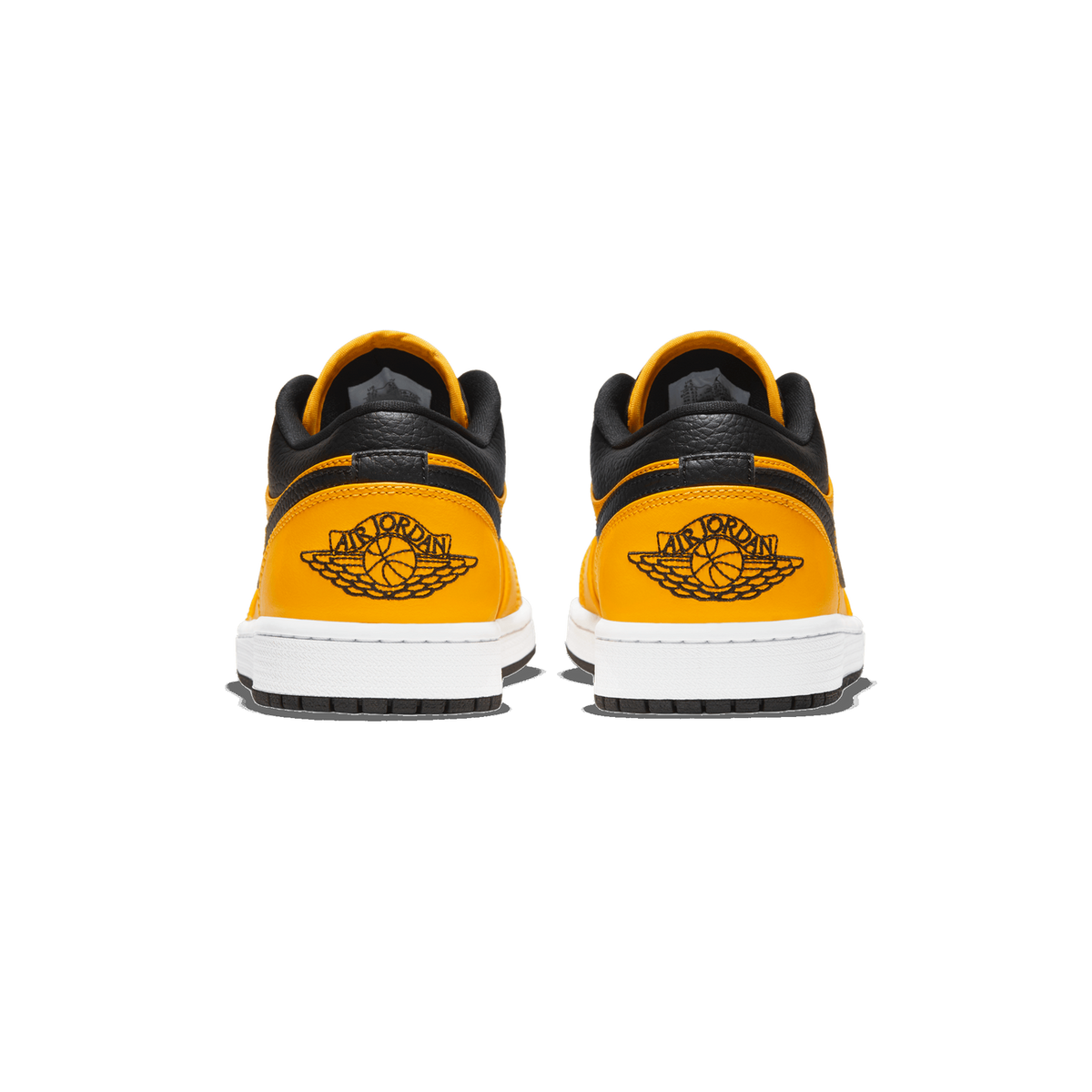 Rear view of a pair of gold, black and white Air Jordan 1 Low sneakers standing side by side, showing the embroidered Air Jordan Wings logo on each heel, black collars, and white midsoles.