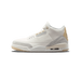 Left Air Jordan 3 Retro Craft Ivory shown from the outside, with toe pointing left, featuring white leather upper, grey elephant-print overlays, and tan heel tab