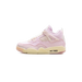 Side view of a pink Air Jordan 4 Retro sneaker with mesh side panels, cream laces, and a cream midsole.
