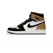 Lateral view of a Jordan 1 Retro High with a patent black toe and heel, white leather mid-panel with black Swoosh, and a metallic gold toe box and heel panel, black laces, on a white midsole with black outsole.