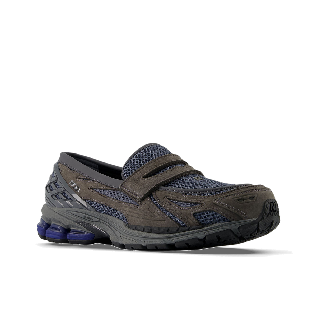 Angled view of a gray New Balance 1906L slip-on shoe with navy mesh panels, a strap across the vamp, and a chunky gray outsole with visible blue cushioning elements.