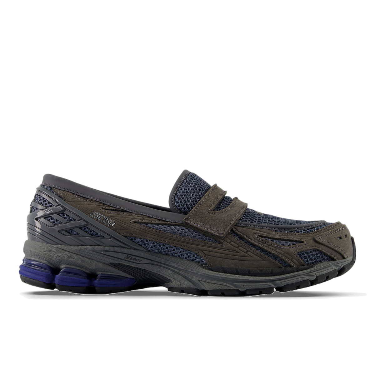 Side view of a gray New Balance 1906L loafer-style sneaker hybrid with navy mesh panels, a strap closure instead of laces, and a gray and purple cushioned sole.