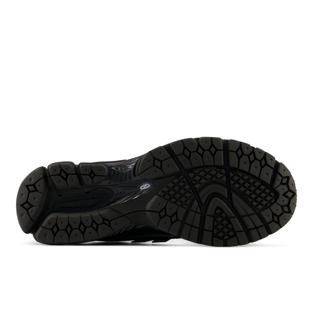 Bottom view of a black New Balance 1906 sneaker showing the textured black rubber outsole tread pattern.
