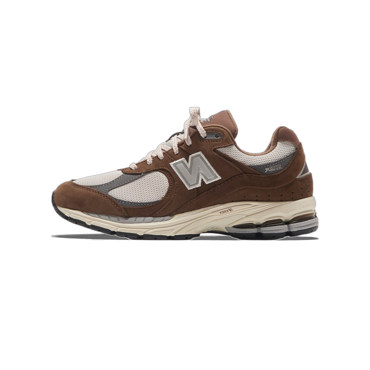 Left New Balance 2002R sneaker in brown suede and beige mesh with grey N logo, shown from the side with toe pointing left.