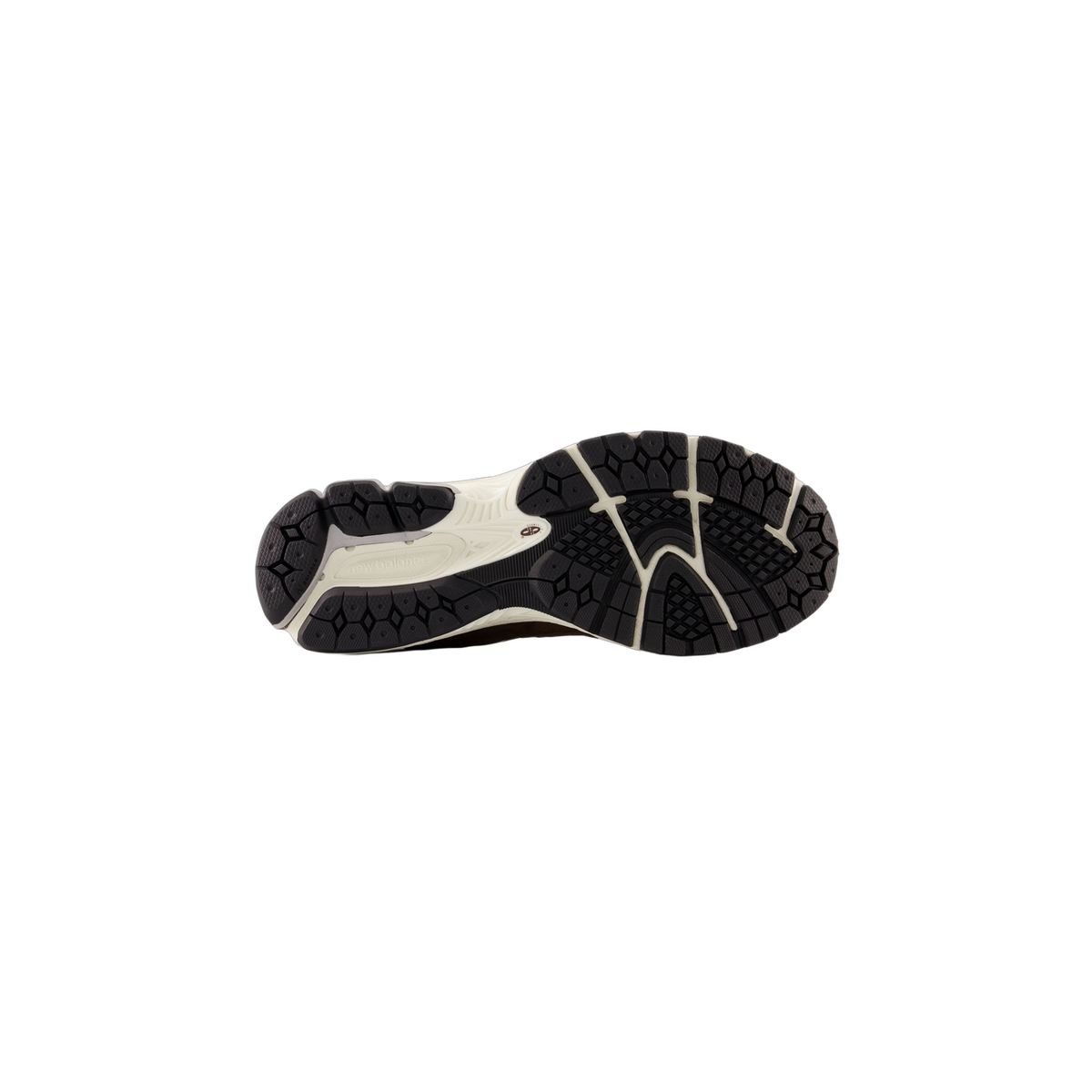 Bottom view of a New Balance 2002R sneaker showing the beige and dark gray textured outsole tread pattern with visible New Balance logo