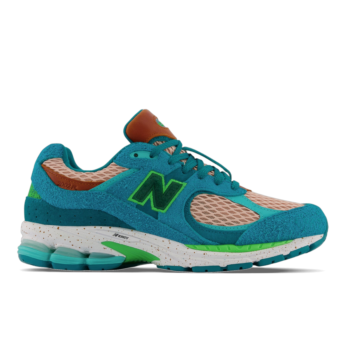 Left shoe of the New Balance 2002R Salehe Bembury Water Be The Guide in teal suede with a peach mesh panel, green N logo, brown leather heel tab, and a white and teal speckled sole with green accents, shown from the outside with toe pointing left.
