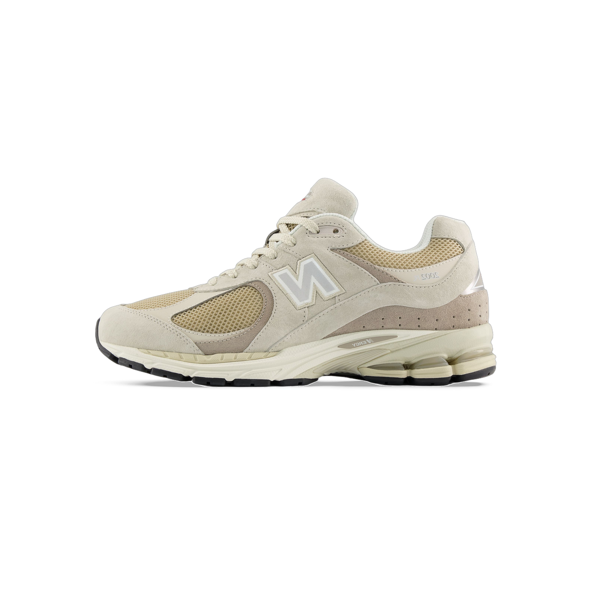 Side view of a beige New Balance 2002R sneaker with tan mesh panels, taupe suede overlays, and a white N logo on the lateral side