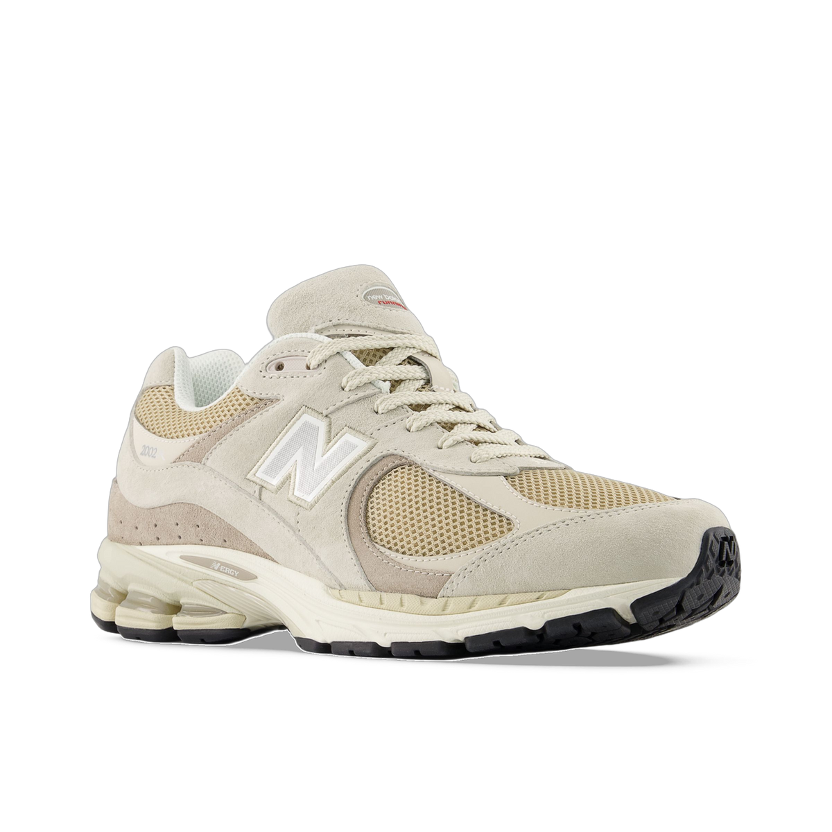 Angled side view of a beige New Balance 2002R sneaker with suede overlays, mesh panels, white N logo, and a cream and black ABZORB sole.