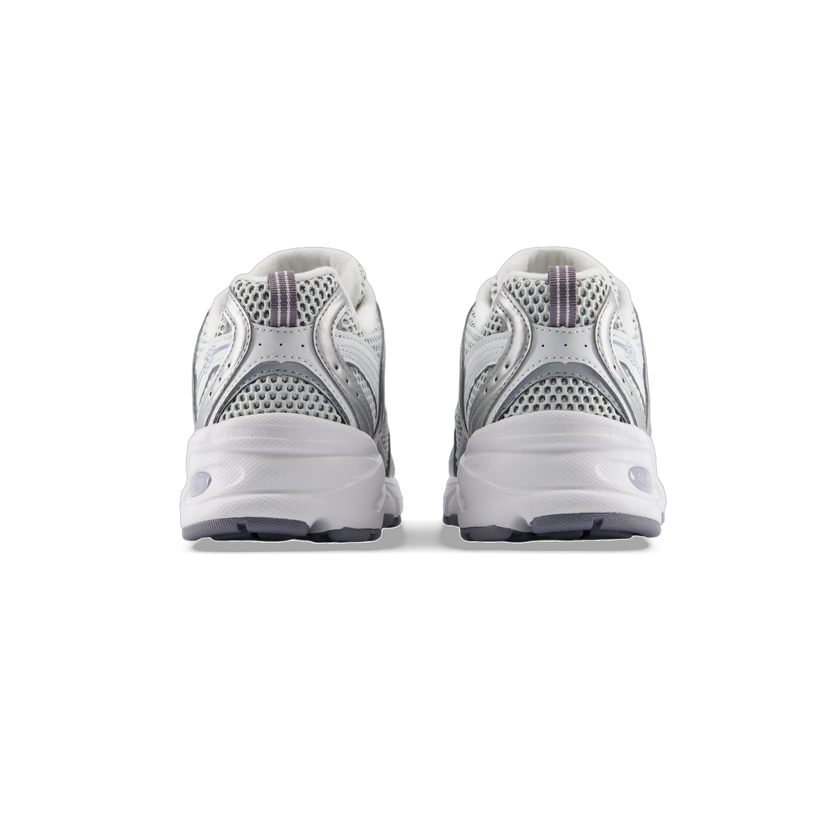 Rear view of a pair of New Balance 530 sneakers in gray, silver, and white with mesh panels and white ABZORB midsoles