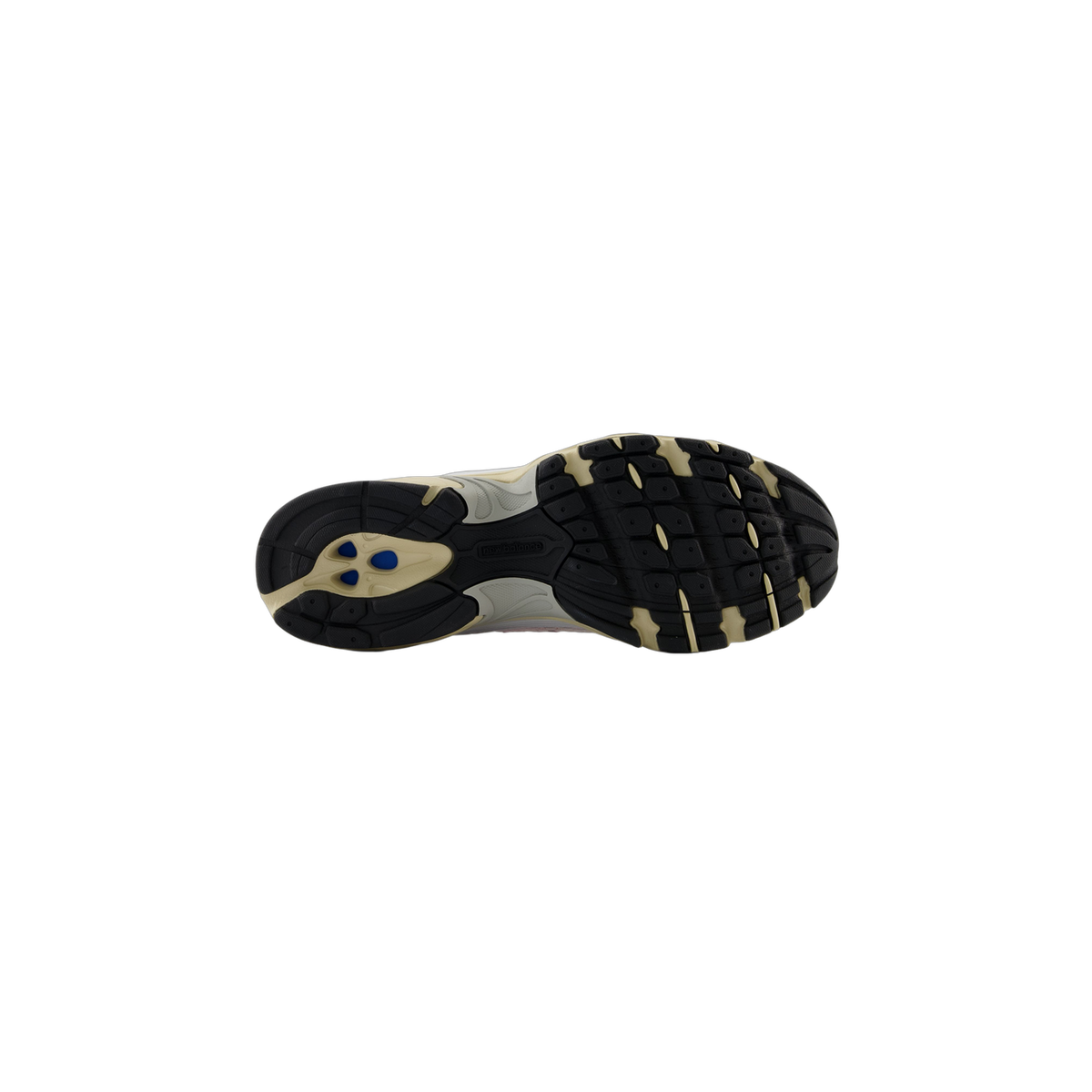 Bottom view of a New Balance 530 sneaker showing a black lugged outsole with tan accents and blue heel pods.