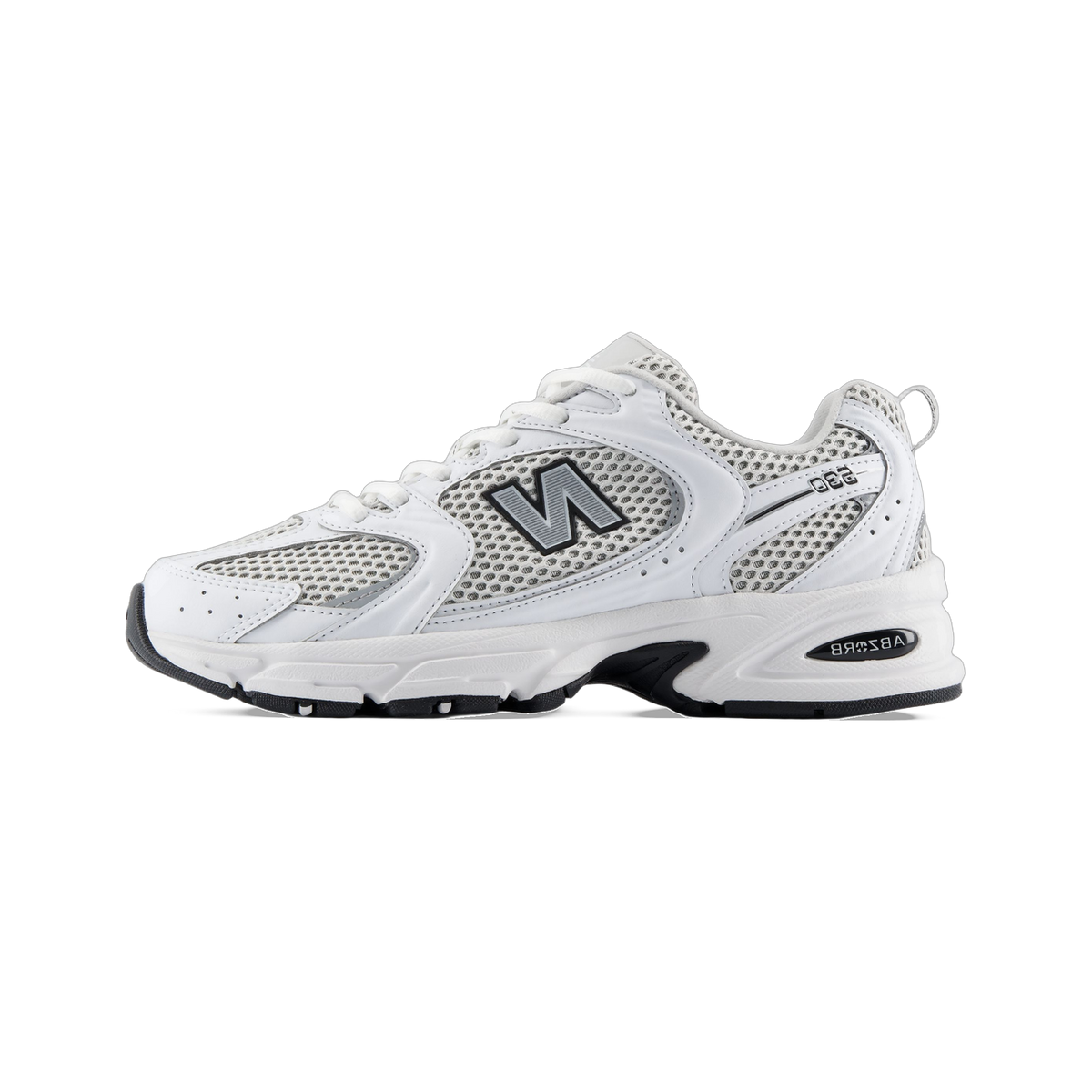 Side view of a white New Balance 530 sneaker with silver mesh panels, grey N logo, and black midsole and outsole, toe pointing left.