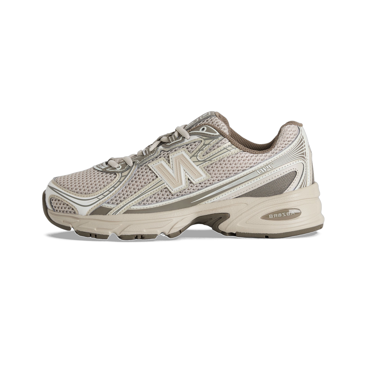 Side view of a beige New Balance 740 running shoe with mesh upper, grey overlays, and a chunky ABZORB midsole.