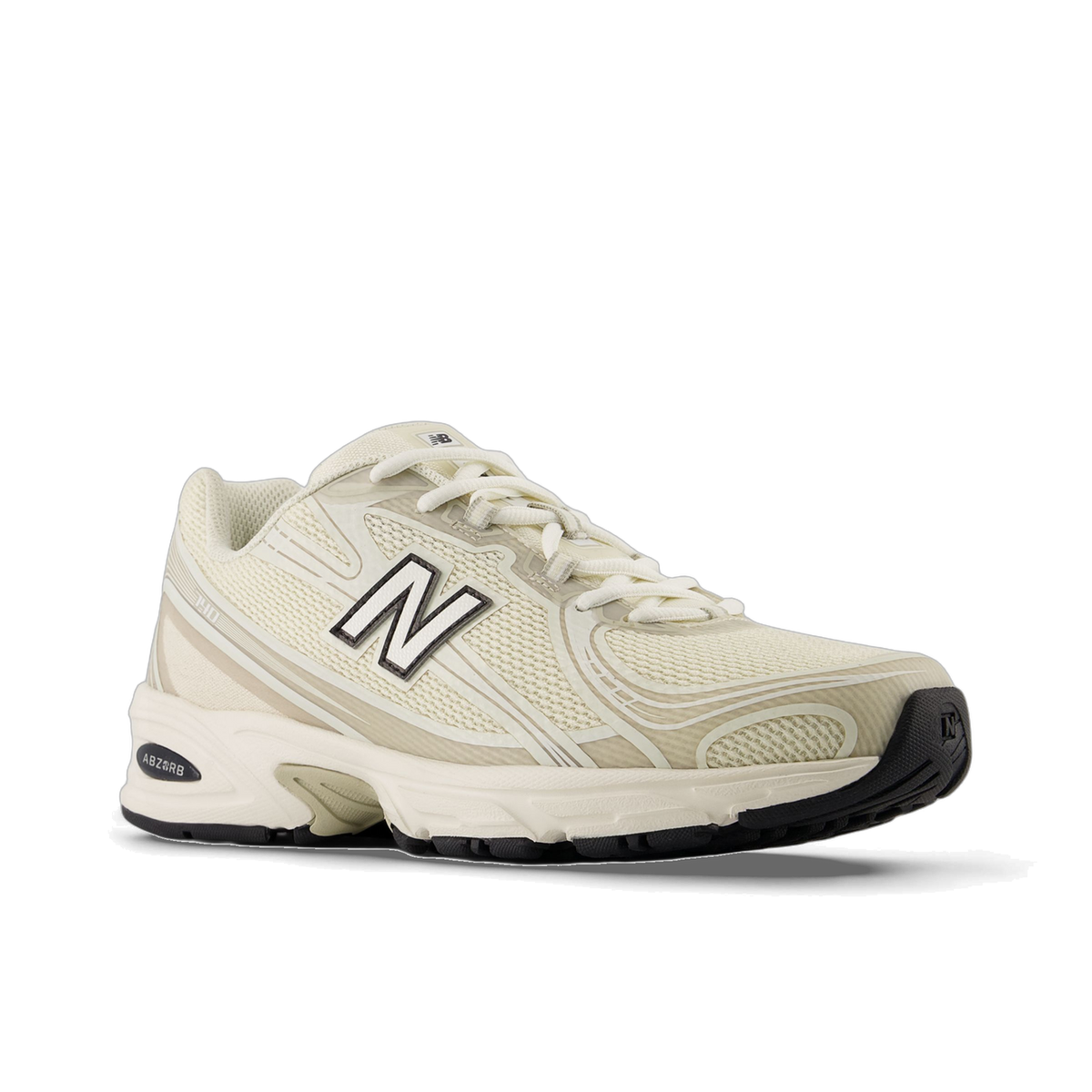 Angled side view of a beige New Balance 740 sneaker with a white N logo, mesh upper, and black ABZORB midsole and outsole, toe pointing left.