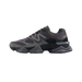 Side view of a black and grey New Balance 9060 sneaker with a chunky midsole and grey N logo on the lateral panel
