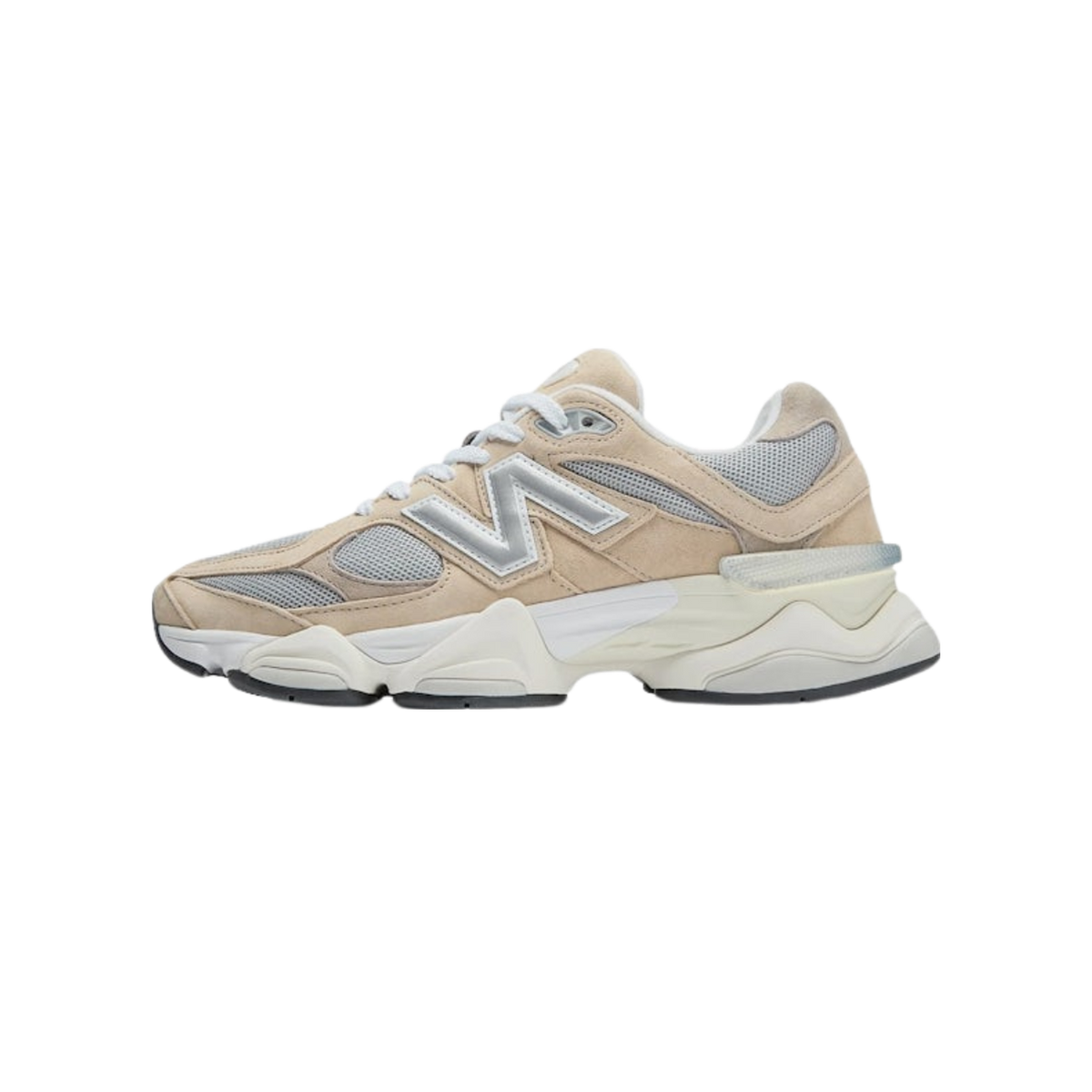 Side view of a beige New Balance 9060 sneaker with grey mesh panels, a silver N logo, white laces, and a chunky white midsole with black outsole, toe pointing left.