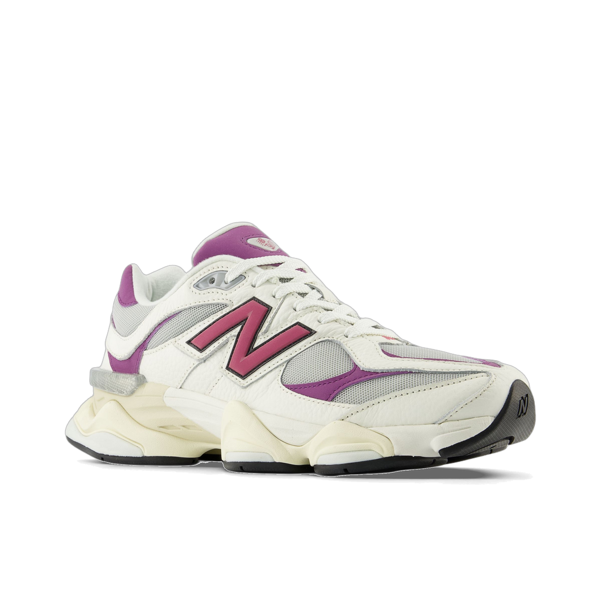 Side view of a white New Balance 9060 sneaker with magenta N logo, purple accents, grey mesh panels, and a cream chunky sole.
