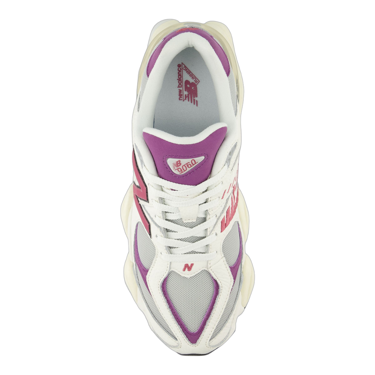 Top-down view of a white New Balance 9060 sneaker with magenta and grey panels, pink N logo, and purple heel and tongue accents