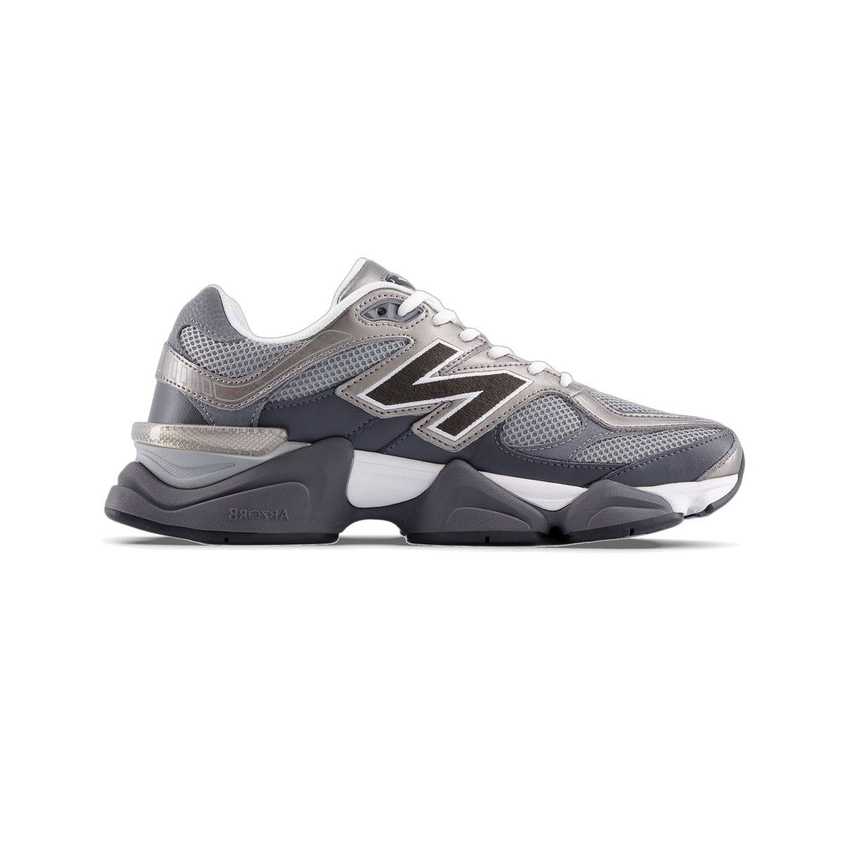 Left New Balance 9060 sneaker in gray and silver tones with dark N logo, viewed from the side with toe pointing left.