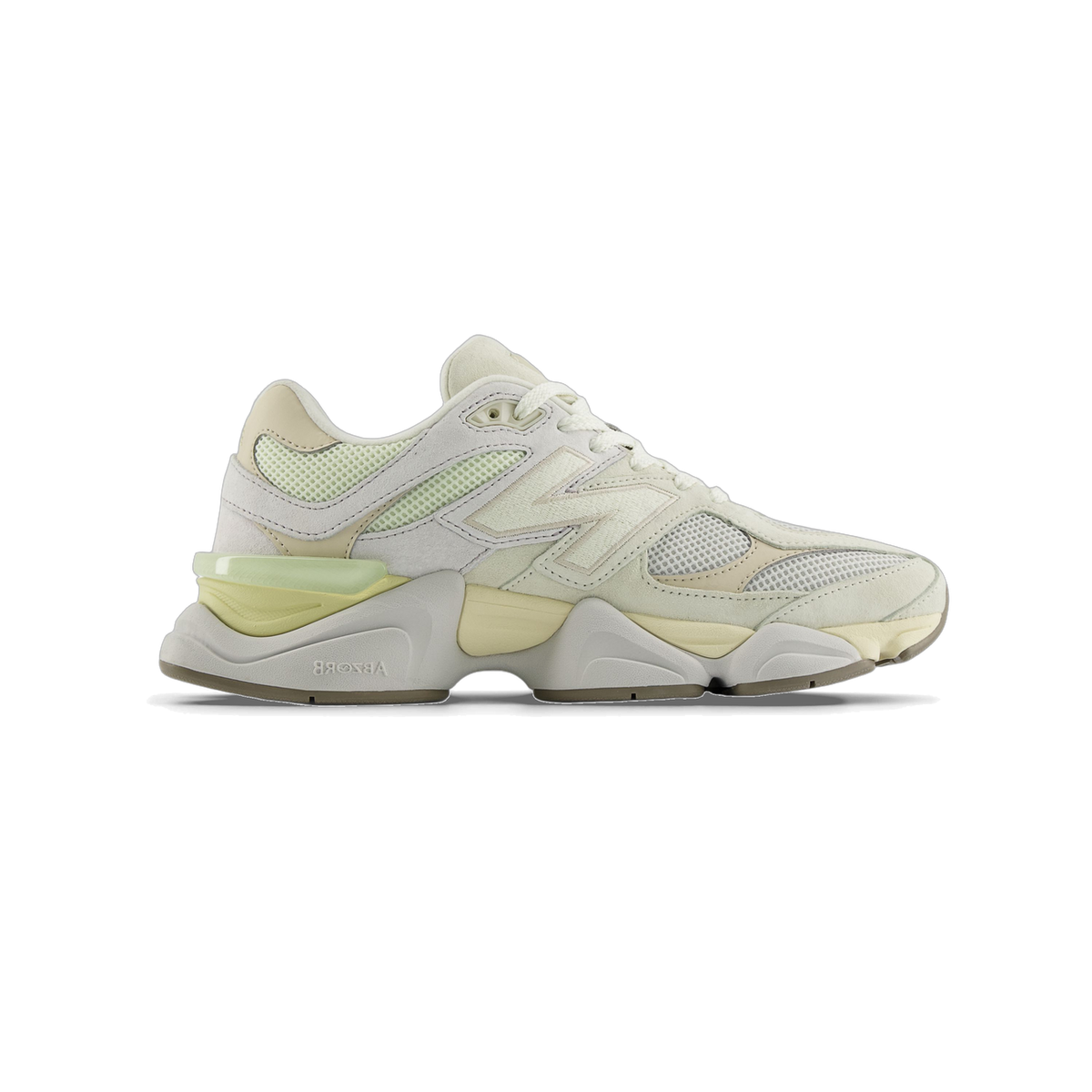 Side view of a cream and pale green New Balance 9060 sneaker with suede and mesh panels, toe pointing left, showing the embroidered N logo and chunky ABZORB midsole.