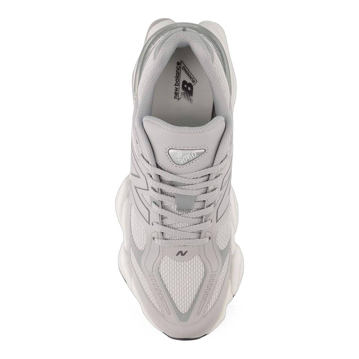 Top-down view of a single gray New Balance 9060 sneaker showing laces, tongue with model number, and mesh upper
