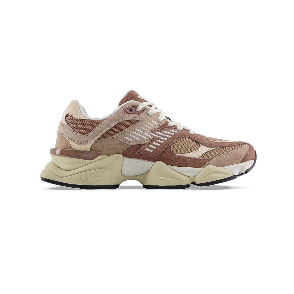 Lateral view of a New Balance 9060 sneaker in brown and tan suede and mesh with white lace-up closure and a chunky cream and beige sole labeled Abzorb.