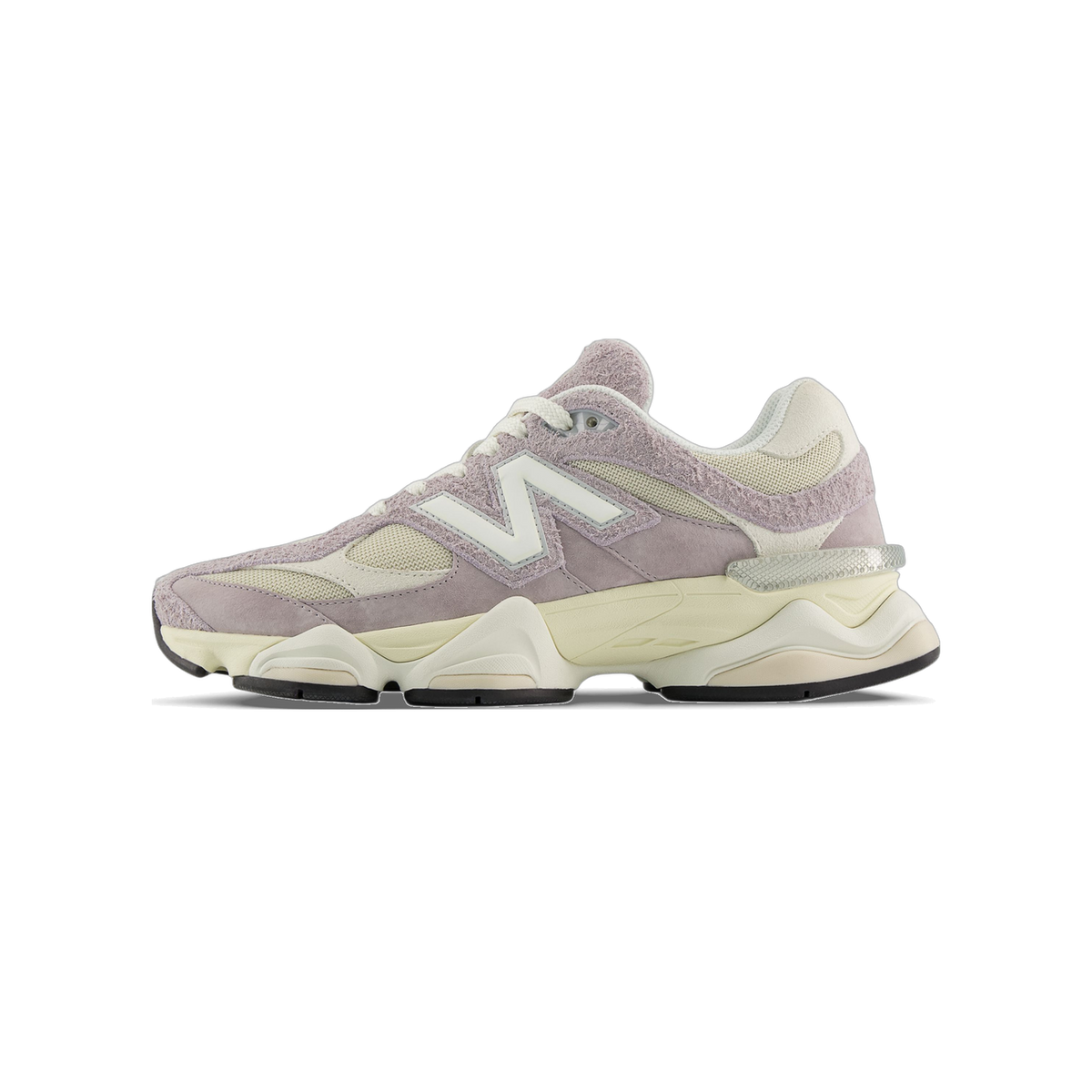 Side view of a New Balance 9060 sneaker in taupe and cream with a suede upper, white N logo, and cream chunky midsole, toe pointing left.