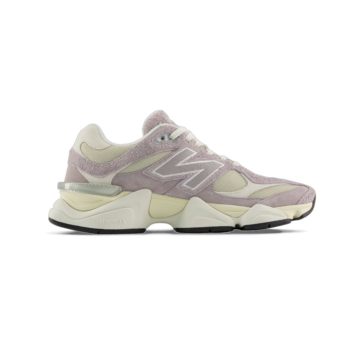 Side view of a single New Balance 9060 sneaker in lavender suede and cream mesh with a chunky cream midsole and visible N logo, toe pointing left.